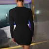 שמלת ערב מיני שחורה שרוול ארוך חצויה- אדריאנה